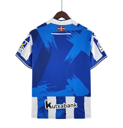Camisa Real Sociedad I 22/23 Macron - Branco e Azul